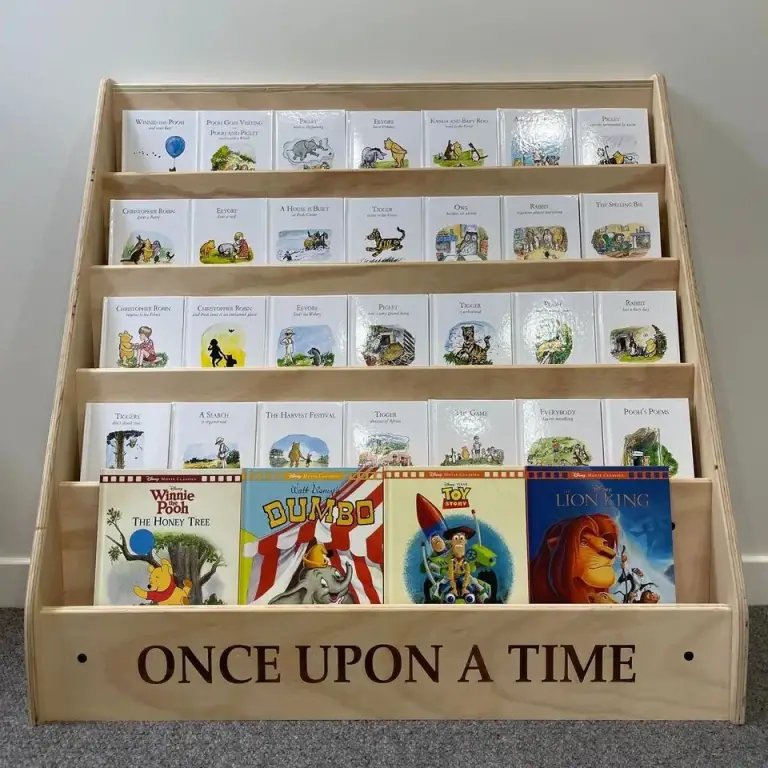 Natural timber front-facing children's bookcase with five tiers and 'Once upon a time' engraved on the front