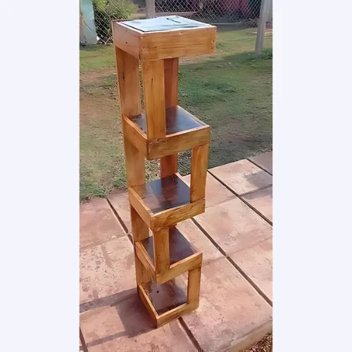 Stained pallet-wood plant stand made from stacked twisting cubes