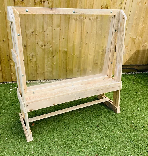 Natural pine standing easel with a clear perspex painting panel and a wide paint tray