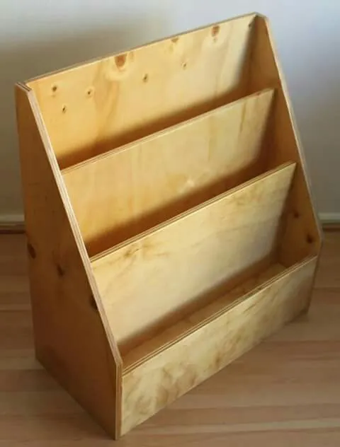 Varnished plywood kids' book display with four stepped tiers