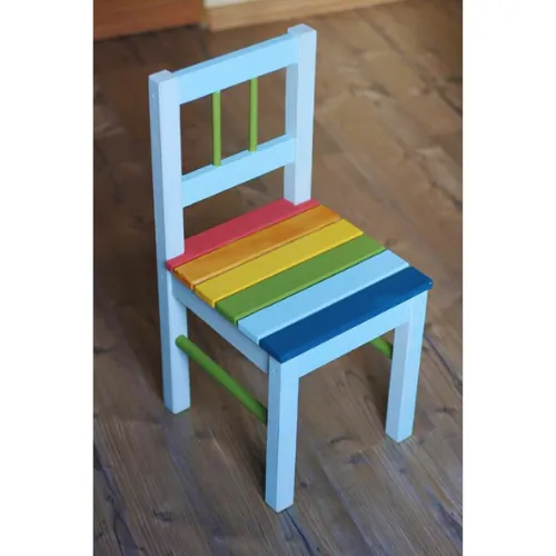 Child's chair with a white frame, green spindles and a rainbow-painted slatted seat