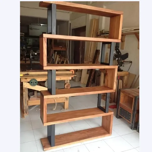 Timber and black steel zigzag bookshelf photographed in a workshop