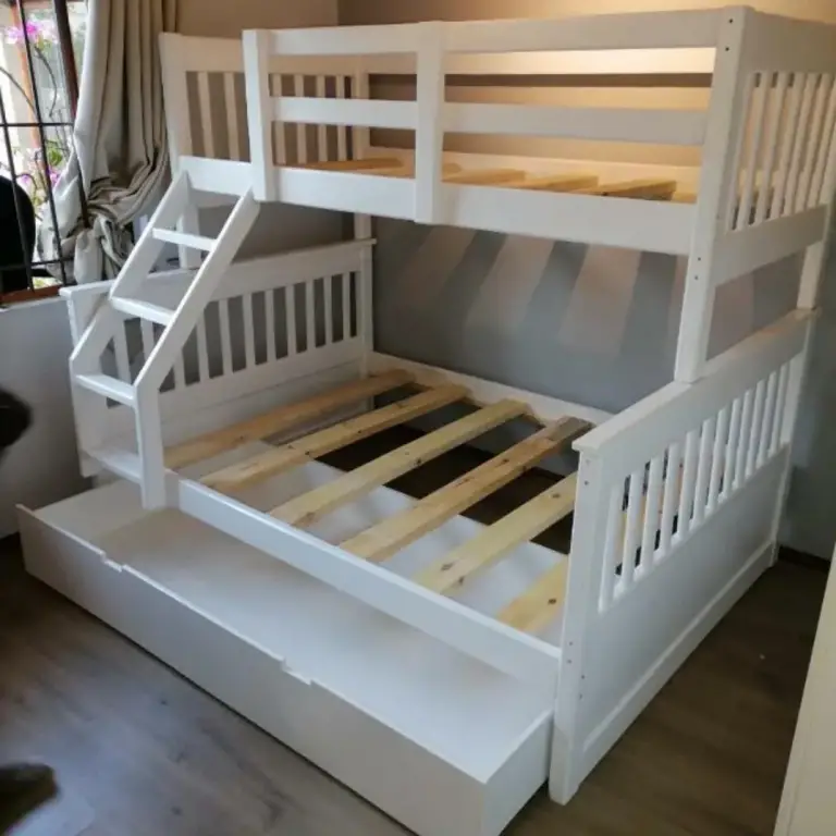 White bunk bed with staircase, pine slats and pull-out trundle drawer